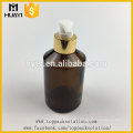 Wholesale empty flat shoulder amber color glass body lotion bottle